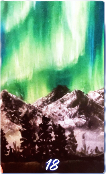 Stormwalker Medicine card 18 featuring mountains beneath an aurora